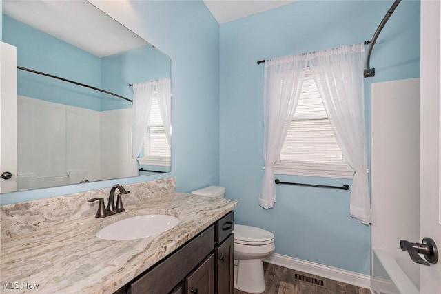 686 Outrigger Cv, Painesville, OH 44077 - bathroom with wood finished floors, vanity, and bathtub / shower combination