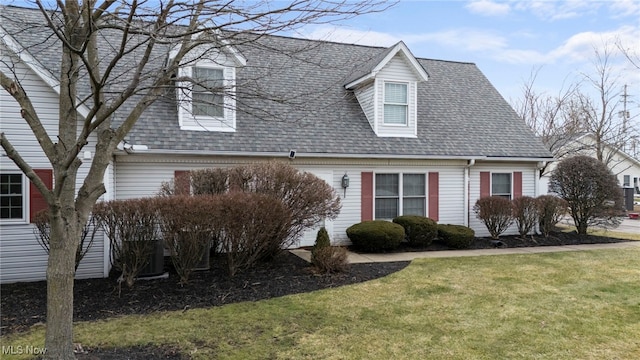 662 2nd St Unit 2, Fairport Harbor, OH 44077 - new england style home with a front yard and a shingled roof