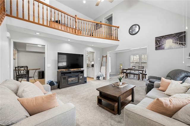 662 2nd St Unit 2, Fairport Harbor, OH 44077 - living room with high vaulted ceiling, carpet flooring, ceiling fan, and recessed lighting