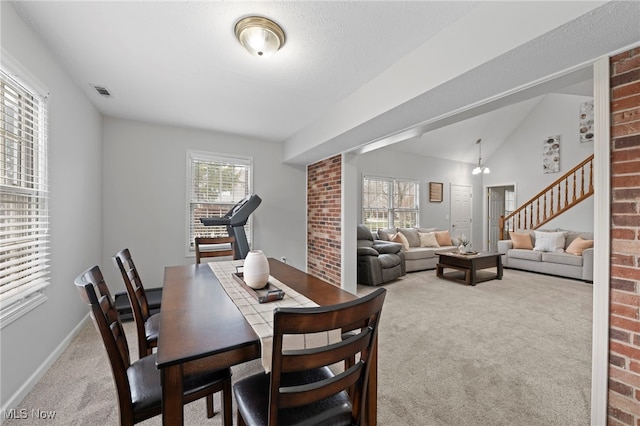 662 2nd St Unit 2, Fairport Harbor, OH 44077 - dining room featuring carpet floors and stairway