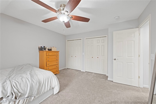 662 2nd St Unit 2, Fairport Harbor, OH 44077 - bedroom with carpet flooring, multiple closets, and ceiling fan