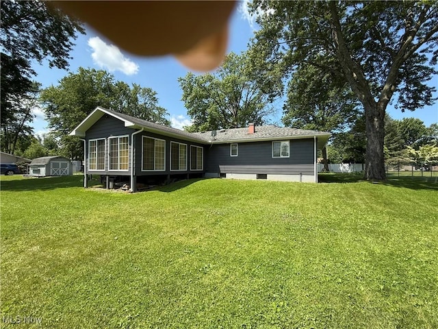 3726 Silvieus St, Ashtabula, OH 44004 - rear view of property featuring a chimney