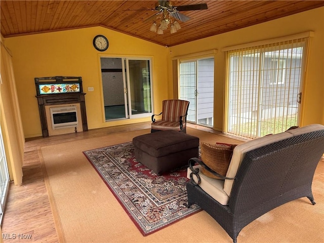 3726 Silvieus St, Ashtabula, OH 44004 - living area featuring wood ceiling, plenty of natural light, vaulted ceiling, ceiling fan, and a fireplace