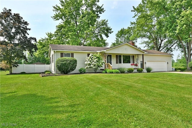2847 Selkirk Bush Rd SW, Warren, OH 44481 - ranch-style home with a garage, a chimney, and driveway