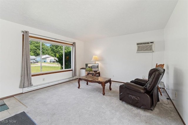 3917 Oxford Dr, Lorain, OH 44053 - living area with an AC wall unit, a baseboard heating unit, and carpet floors