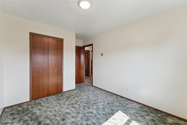 3917 Oxford Dr, Lorain, OH 44053 - unfurnished bedroom featuring carpet flooring and a closet