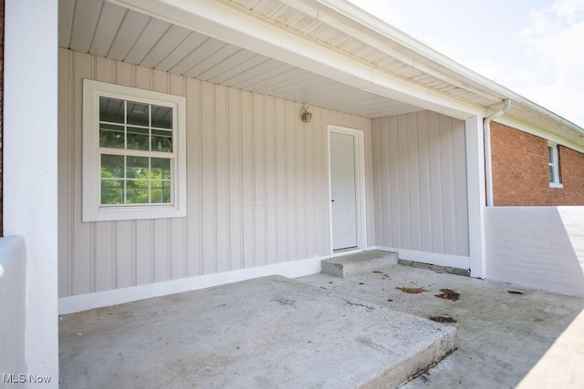 4029 Minard Rd NW, Dover, OH 44622 - view of exterior entry with a patio