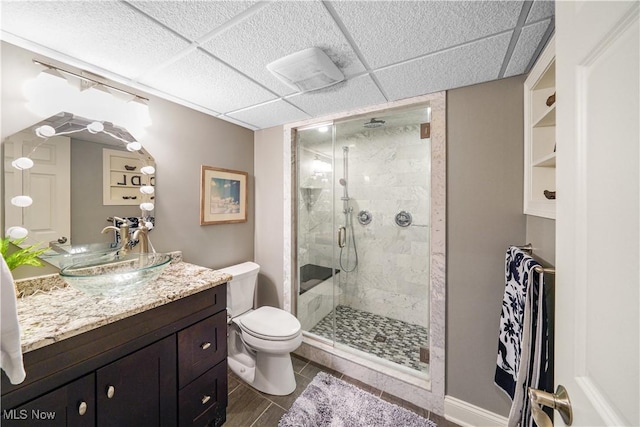 196 Chisholm Ct, Aurora, OH 44202 - full bathroom featuring a stall shower, vanity, and a drop ceiling