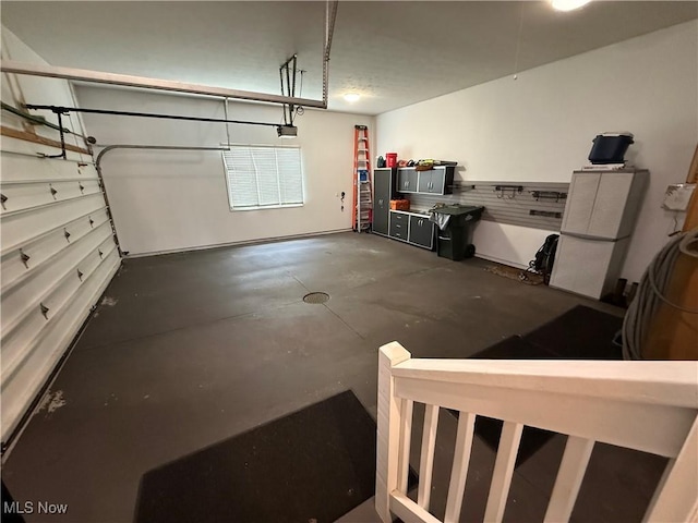 196 Chisholm Ct, Aurora, OH 44202 - garage featuring a garage door opener