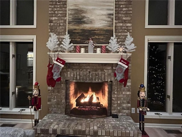 196 Chisholm Ct, Aurora, OH 44202 - detailed view of a fireplace and wood finished floors
