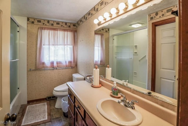 525 Marquardt Ave NE, North Canton, OH 44720 - full bath featuring wallpapered walls, vanity, and stone finish floors
