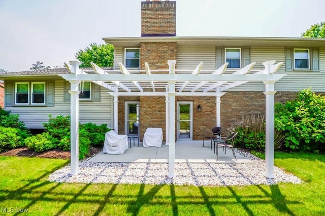 525 Marquardt Ave NE, North Canton, OH 44720 - rear view of property featuring a pergola, a patio, a chimney, and brick siding