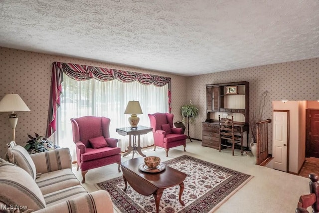 525 Marquardt Ave NE, North Canton, OH 44720 - living area featuring a textured ceiling, carpet flooring, and wallpapered walls