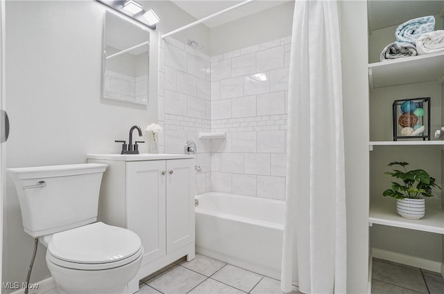 935 Portage Lakes Dr, Coventry Township, OH 44319 - bathroom with tile patterned floors, shower / bath combo with shower curtain, and vanity