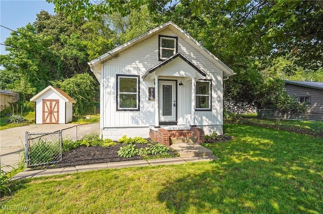 935 Portage Lakes Dr, Coventry Township, OH 44319 - bungalow featuring a storage unit and board and batten siding