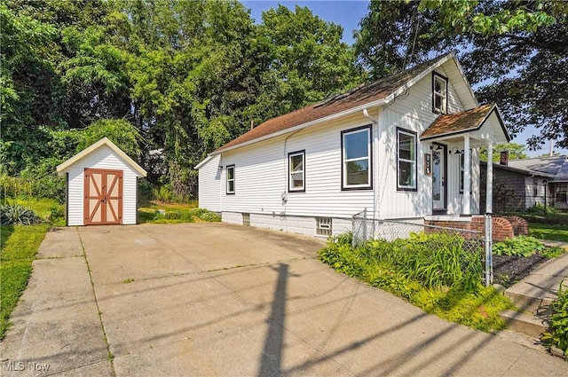 935 Portage Lakes Dr, Coventry Township, OH 44319 - view of front of house featuring a storage unit