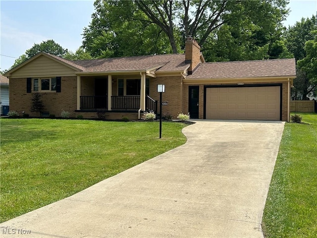 7295 Clovermeade Ave, Poland, OH 44514 - ranch-style house with a porch, brick siding, concrete driveway, and an attached garage
