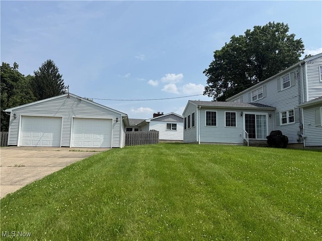 3022 Heatherbrae Dr, Poland, OH 44514 - view of green lawn featuring a detached garage and an outdoor structure