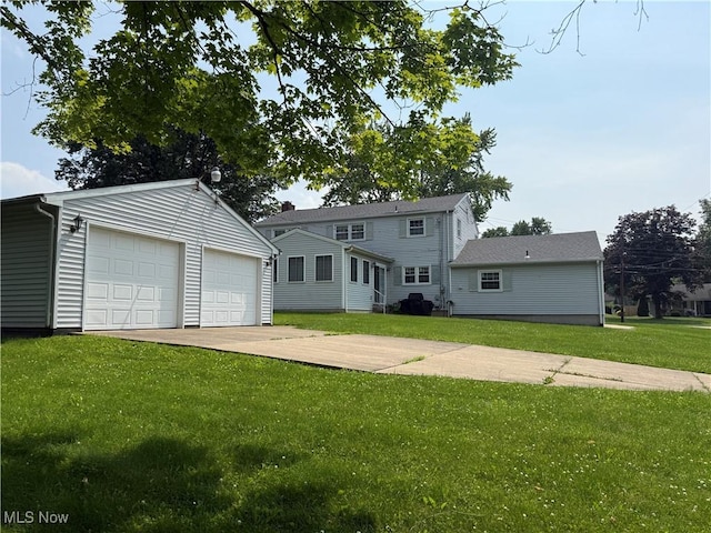 3022 Heatherbrae Dr, Poland, OH 44514 - view of front facade featuring an outdoor structure, a front lawn, and a garage