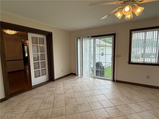 3022 Heatherbrae Dr, Poland, OH 44514 - unfurnished room featuring light tile patterned floors and a ceiling fan