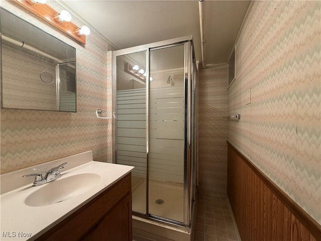 3022 Heatherbrae Dr, Poland, OH 44514 - full bathroom featuring wallpapered walls, a stall shower, vanity, and tile patterned flooring