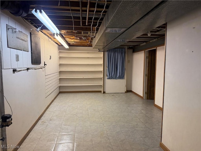 3022 Heatherbrae Dr, Poland, OH 44514 - basement with tile patterned floors and baseboards