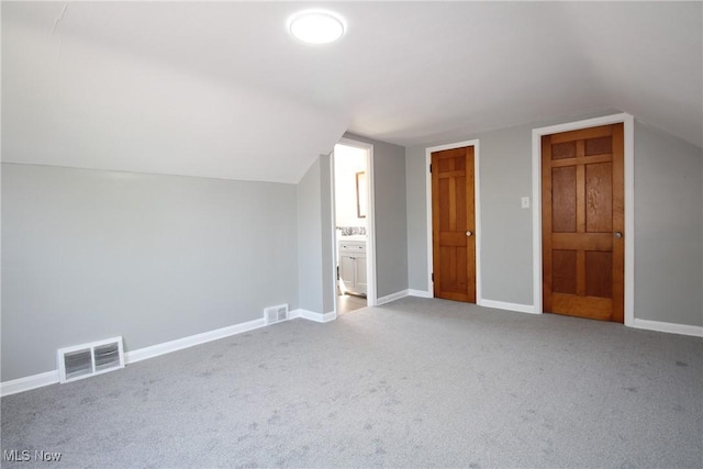 230 E 242nd St, Euclid, OH 44123 - additional living space featuring lofted ceiling and carpet