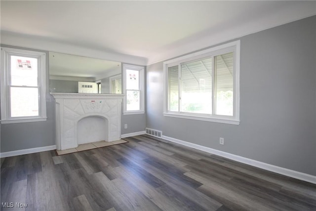 230 E 242nd St, Euclid, OH 44123 - unfurnished living room with wood finished floors and a premium fireplace