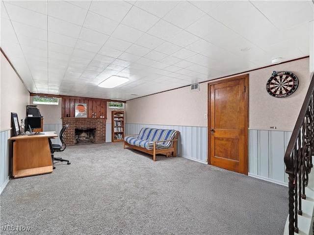 3845 Hillbrook Rd, University Heights, OH 44118 - carpeted home office with a brick fireplace and wainscoting