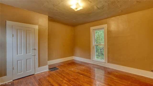 59590 Vocational Rd, Byesville, OH 43723 - unfurnished room with wood-type flooring and baseboards