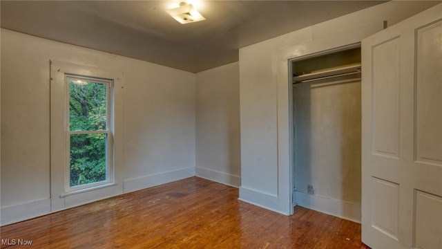 59590 Vocational Rd, Byesville, OH 43723 - unfurnished bedroom featuring wood finished floors and baseboards
