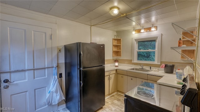 59590 Vocational Rd, Byesville, OH 43723 - kitchen with freestanding refrigerator, range with electric cooktop, light countertops, and open shelves