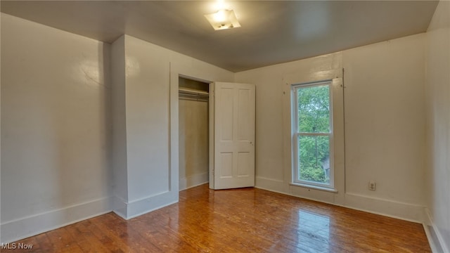 59590 Vocational Rd, Byesville, OH 43723 - unfurnished bedroom featuring wood finished floors and a closet