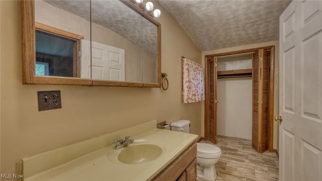 59590 Vocational Rd, Byesville, OH 43723 - bathroom featuring a textured ceiling, wood finished floors, and vanity