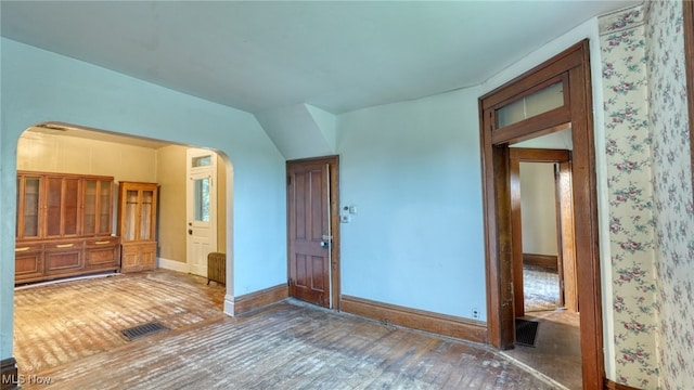 59590 Vocational Rd, Byesville, OH 43723 - foyer entrance with arched walkways and wood finished floors
