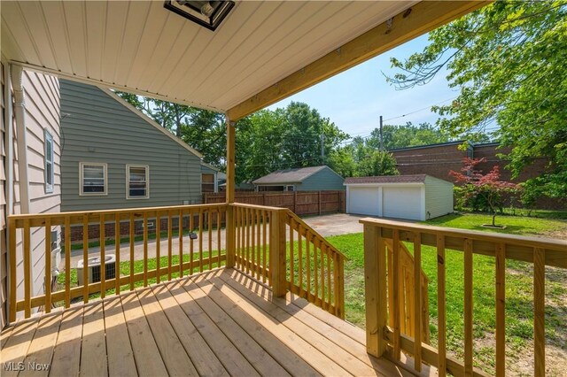17631 Milburn Ave, Cleveland, OH 44135 - wooden deck with an outbuilding and a garage