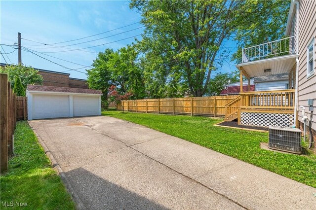 17631 Milburn Ave, Cleveland, OH 44135 - view of yard featuring a detached garage, an outdoor structure, a balcony, and a deck
