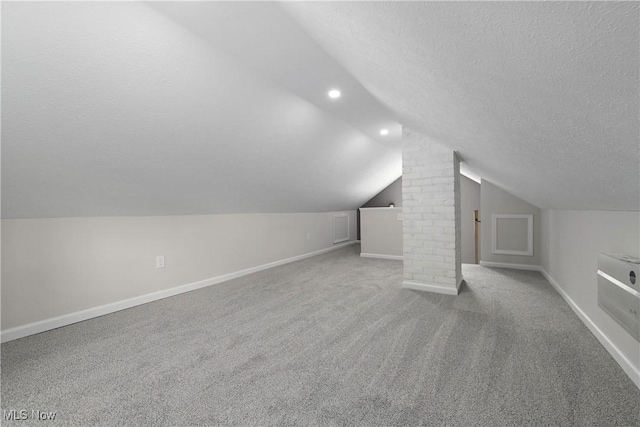 17631 Milburn Ave, Cleveland, OH 44135 - bonus room featuring a textured ceiling, vaulted ceiling, and carpet floors
