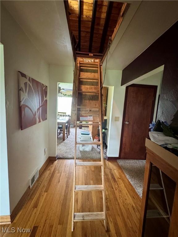1803 Stillwagon Rd, Warren, OH 44484 - corridor featuring light wood-style flooring and wooden ceiling