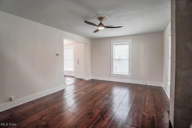 1004 Clarendon Ave SW, Canton, OH 44710 - unfurnished room featuring ceiling fan and dark wood-style floors