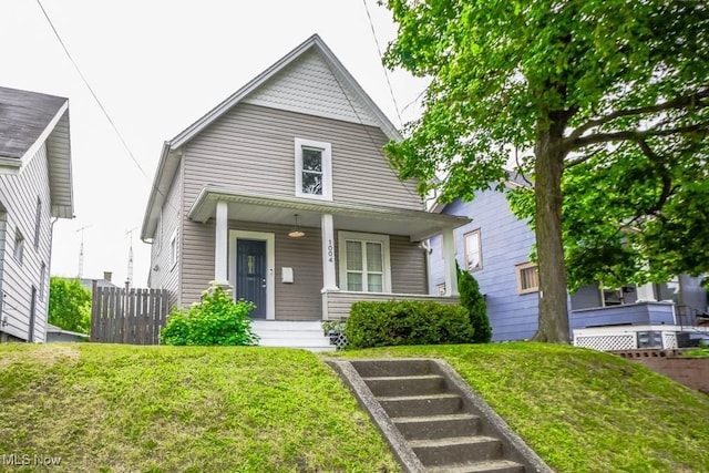 1004 Clarendon Ave SW, Canton, OH 44710 - view of front facade featuring covered porch