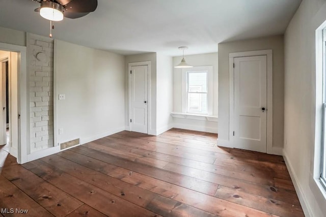 1004 Clarendon Ave SW, Canton, OH 44710 - unfurnished room featuring hardwood / wood-style floors and a ceiling fan