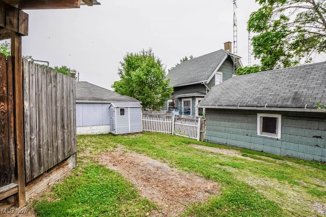 1004 Clarendon Ave SW, Canton, OH 44710 - fenced backyard featuring a storage shed