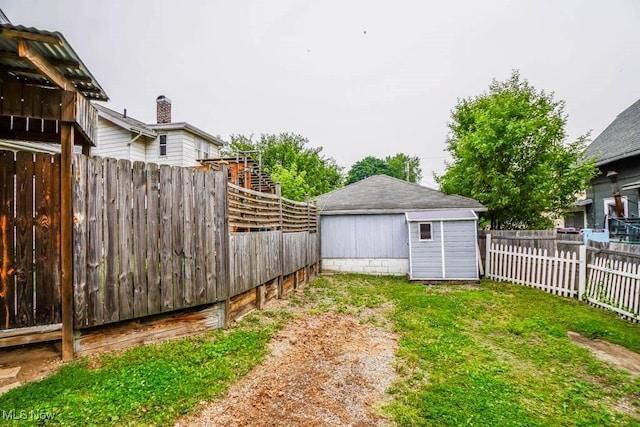 1004 Clarendon Ave SW, Canton, OH 44710 - fenced backyard with an outbuilding