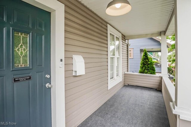 1004 Clarendon Ave SW, Canton, OH 44710 - porch with a ceiling fan