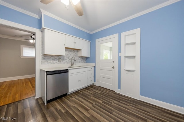 9711 Plymouth Ave, Cleveland, OH 44125 - kitchen featuring stainless steel dishwasher, ceiling fan, light countertops, white cabinets, and ornamental molding