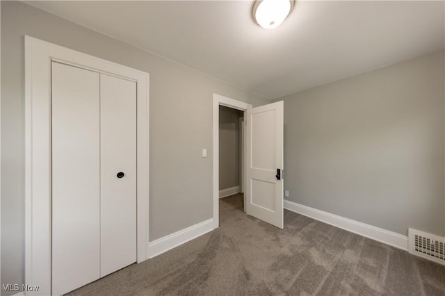 9711 Plymouth Ave, Cleveland, OH 44125 - unfurnished bedroom with carpet and a closet