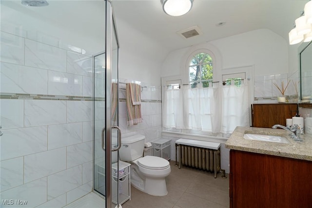 17805 Van Aken Blvd, Shaker Heights, OH 44122 - full bath featuring radiator, tile patterned floors, vanity, a stall shower, and vaulted ceiling