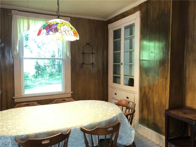 305 Adolphus St, Chester, WV 26034 - dining room featuring wood walls and ornamental molding