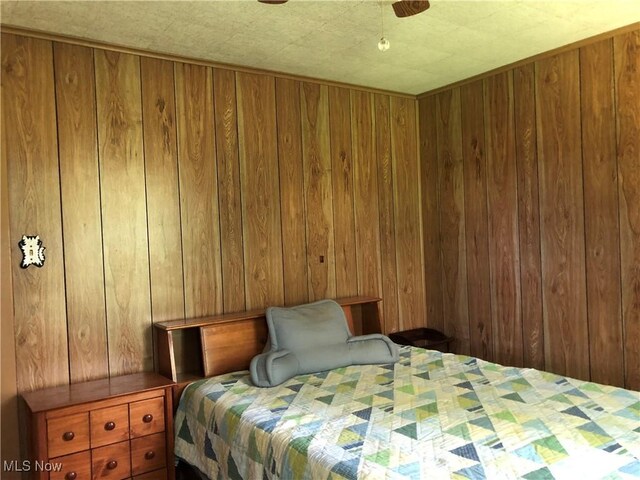 305 Adolphus St, Chester, WV 26034 - bedroom featuring wood walls